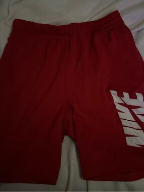 Nike Kids Red Athletic Shorts with White Logo